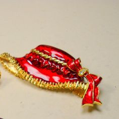 "SALE Lot of 3 Pins, Purple & Red w Hats, Party Girls Brooch, Club Gift, Rhinestones And Enamel on Goldtone, Destash These glam even gaudy enamel brooches average is 2\" by 1 3/4\" ( 5.08cm x 4.445cm ) perfect condition, just the backs are starting to darken never used samples for that hat club Want to see more of my PINS? I have Hundreds http://www.etsy.com/shop/VintageStarrBeads/search?search_query=pins&search_type=user_shop_ttt_id_5465104&shopname=VintageStarrBeads --------------- Red Brooch For Valentine's Day Party, Elegant Gold Mini Hats For Gifts, Elegant Gold Mini Hats For Gift, Gold Brooches For Valentine's Day Party, Elegant Red Holiday Brooch, Elegant Red Holiday Brooches, Hat Club, Enamel Brooch, Party Girls