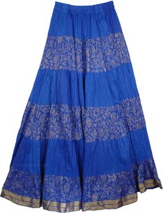 Blue Cotton Crisp Tall Skirt with Wide Hem with Golden Print and Brocade - A beauty in real blue - a beautiful true blue skirt with crinkle effect that is in a bohemian royal style with alternative plain and gold printed fabric. Skirt is stylish, easy to wear, and is one of this season`s hottest looks! This is a quality cotton Crinkle Long Skirt with Golden Brocade-lace Work and golden floral rendition in hand block print. The Tall Cotton Skirt has an elastic and drawstring waist, with cotton ha Traditional Blue Flowy Skirt, Traditional Flowy Blue Skirt, Festive Long Blue Skirt, Traditional Blue Lined Skirt, Traditional Blue Maxi Skirt, Traditional Blue Flowy Maxi Skirt, Traditional Long Blue Skirt, Blue Flowy Maxi Skirt For Festivals, Festival Blue Lined Maxi Skirt