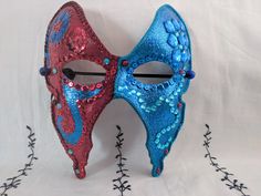 A unique hand-painted & hand-decorated carnival mask. Hand-painted paper base mask by artist Sarah Tomlinson, The Girl with many Secrets. Decorated with jewels, sequins & rhinestones and brushed with a final sparkle layer. Coated twice with a final varnish finish. Backers glued on back of mask, so surface of the mask does not sit directly on face. Elastic used to secure mask on face. Artist signature "The Girl" on back. Please check out Girl with many Secrets Etsy shop for more masks, artwork & Handmade Halloween Festival Masquerade Mask, Fantasy Masks For Carnival Events, Artistic Halloween Mask For Costume Party, Artistic Masks For Halloween Costume Party, Fantasy Masks And Prosthetics For Carnival Festival, Fantasy Masks For Carnival, Artistic Halloween Masks For Fantasy Events, Handmade Fantasy Masquerade Mask For Costume Party, Multicolor Masks And Prosthetics For Mardi Gras Carnival