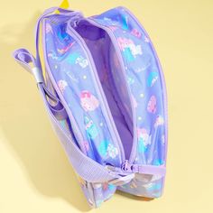 Bring your essentials safely even while on-the-go by using this kawaii shoulder bag! It’s illustrated with cute prints of Kiki, Lala, and lots of twinkling stars! The purple sling bag also has an outer pocket slot and a roomy compartment inside. Made from soft polyester Comes with dual zipper closures and an adjustable bag strap Purple Shoulder Bag For School With Zipper Pocket, School Shoulder Bag With Zipper Pocket In Purple, Purple Shoulder Bag With Zipper Pocket For School, Purple Kawaii Shoulder Bag For Travel, Kawaii Purple Shoulder Bag For Travel, Cute Purple Shoulder Bag For School, Purple Kawaii Shoulder Bag, Kiki Lala, Adjustable Bag Strap