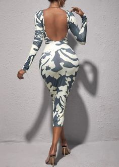 Capture everyone's attention in this graphic print backless bodycon dress. Crafted with a luxurious green hue and long sleeves, the midi dress is sure to turn heads with its eye-catching design. Perfect for any occasion, you can rest assured you'll dazzle all night. Fabric: Slight Stretch Fit Type: Slim Fit Composition: 95% Polyester, 5% Elastane Trendy Long Sleeve Midi Dress For Club, Long Sleeve Backless Dress For Date Night, Spring Midi-length Bodycon Backless Dress, Spring Bodycon Midi Backless Dress, Spring Backless Bodycon Midi Dress, Spring Bodycon Backless Midi Dress, Trendy Long Sleeve Bodycon Midi Dress, Chic Green Backless Bodycon Dress, Long Sleeve Midi Dress For Spring Club