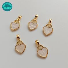 14k Gold Plated Heart Pendant,Shell Pendant,Heart Necklace Pendant,Gold Heart Pendant ❥Material: Base metal: Brass+Shell Real 14K Gold plated Brass,with Color protecting Layer. ➤Lead free;Nickel Free ❥Kindly Note:Not easy to get tarnished under proper care. ❥Size:Width:11mm Length:17mm ❥ Shipping ➤Usually It will take 2-3 Weeks to US ➤Usually It will take 2-4 Weeks to other countries Gold Heart Necklace With Pearl Pendant For Valentine's Day, Valentine's Day Gold Heart Necklace With Pearl Pendant, Gold Heart-shaped Pearl Pendant Jewelry, Gold Heart Jewelry For Jewelry Making, Gold Heart Necklace With Pearl Pendant, Gold Heart Necklace With Beads For Mother's Day, White Heart Pendant Necklace For Jewelry Making, Valentine's Day Heart Necklace With Pearl Pendant, Heart Shaped Pearl Pendant Necklace For Mother's Day