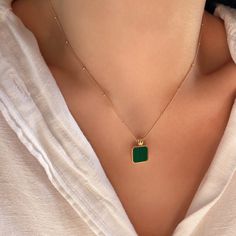 "Elevate your everyday elegance with our Dainty Natural Malachite Necklace, a whisper of luxury meant to gracefully adorn your neckline with its subtle charm. Meticulously handcrafted, this piece features a genuine, vibrant malachite gemstone, renowned for its stunning verdant hues and unique, natural banding, all suspended from a luminous 925 sterling silver satellite chain. A celebration of minimalist aesthetics, this necklace is not merely an accessory but a petite spectacle of nature's artistry, designed to seamlessly blend with your distinct style while adding a dash of understated sophistication. Gift-ready and poised to charm, it makes for a thoughtful and timeless treasure for the discerning woman who delights in the delicate allure of gemstone jewelry. //OUR COMMITMENT: WHAT YOU S Elegant May Birthstone Necklace With Rectangular Pendant, Silver Emerald Necklace With Clavicle Chain As Gift, Elegant Green Necklace With Rectangular Pendant, Elegant Green Rectangular Pendant Necklace, Elegant Sterling Silver Chain Necklace With Square Pendant, Dainty Necklace With Rectangular Pendant, Green Sterling Silver Necklace For Her, Elegant Green Clavicle Chain Necklace, Elegant Green Pendant Chain Necklace