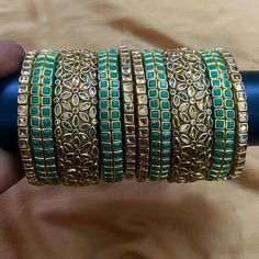 Enhance your beauty with handmade jewelery. VClassy gives a perfect Silk thread and Kundan design bangles for all your special occasions. It's a perfect gifting option for wedding, housewarming ceremony, baby shower, return gift.  We provide a wide range of Silk thread jewellery in different categories in attractive colors and design with finest finishing. Handmade Kundan Silk Thread Bangle | Indian Jewelry - 2 Set Green & silver (Each set has 5 bangles - 1 Grand middle bangle, 2 broad bangle an Handmade Rectangular Jewelry For Festive Occasions, Green Rectangular Jewelry For Party, Elegant Rectangular Festive Jewelry, Adjustable Green Bangle For Wedding, Adjustable Rectangular Jewelry For Wedding, Adjustable Green Wedding Bangle, Adjustable Rectangular Wedding Jewelry, Adjustable Green Bangle For Celebration, Fusion Style Stackable Wedding Jewelry