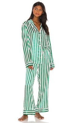 Find SHOW ME YOUR MUMU Classic Pj Set In Green,white on Editorialist. Show Me Your Mumu Classic PJ Set in Green,White. - size L (also in M, S, XL, XS) Show Me Your Mumu Classic PJ Set in Green,White. - size L (also in M, S, XL, XS) 96% poly 4% spandex. Made in China. Machine wash . Front button closure. Breast pocket. Elasticized waistband with drawstring closure. Satin fabric. Item is sold as a set. SHOW-WI6. MR0-4398. Mumu is not simply a garment, it is a lifestyle. Spontaneous. Fun. Easy goin Glowing Skin Makeup, Beauty Giveaway, Holiday Attire, Christmas Pjs, Christmas 2020, Show Me Your Mumu, Revolve Clothing, Style Expert, Fit Check