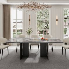 a dining room table with chairs and a chandelier