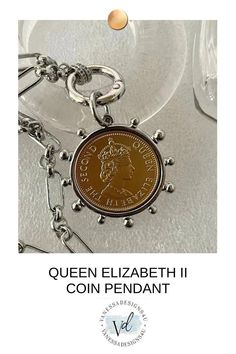 Queen Elizabeth II Gold Coin Pendant, Silver Multi Link Chain Necklace, Reproduction Royal Coin Pendant, Art Deco Silver bezel. Spring lock clasp with CZ connectors. Material: Bezel is made of Cast Zinc Alloy and the coin is of Brass Measure - Bezel and coin = 40mm Coin = 28mm Silver Coin Necklace As Gift, Silver Coin Necklace With Chain As Gift, Silver Coin Necklace With Chain For Gift, Silver Coin-shaped Necklace With Chain, Silver Coin Necklace With Chain, Vintage Round Coin Necklace With Chain, Vintage Silver Coin Necklace With Chain, Silver Coin Chain Necklace Gift, Silver Coin Chain Necklace As Gift