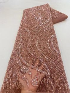 This high quality Fabric is measured in 5 Yards With Embroidered Beading and Sequin. It is soft, very delicate and beautiful. This high Quality Fabric is made with Fashion embroidered rhinestones can be used in making party wedding dresses, skirts, shawls, scarves and other other fashion apparels as you would like. Size : Length : 5 yards (180 inch). Width: 50 inch (Please allow slight deviation for the measurement data ,±1 inch) Material: 100% Polyester, Tulle Lace Fabric, Eco-Friendly embroide Elegant Organza Embroidered Fabric For Banquets, Elegant Embroidered Organza Fabric For Banquet, Elegant Organza Embroidered Fabric For Banquet, Elegant Embroidered Tulle Fabric For Party, Glamorous Fitted Embroidered Fabric For Wedding, Elegant Embellished Tulle Fabric For Party, Elegant Embellished Fitted Tulle Fabric, Elegant Pearl Embroidered Tulle Fabric For Party, Elegant Tulle Fabric With Pearl Embroidery For Party