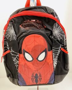 MARVEL The Ultimate Spiderman 16" Super Hero Backpack School Bag~Book Bag This awesome Ultimate Spiderman backpack is a pack that your child can easily carry books, gym clothes, pencils, and more! The day pack features a roomy main compartment and side mesh pockets with webbing detail. The book bag can be hung up when not in use by the webbed locker loop. Bring your favorite superhero back to school! Features   Multiple compartments to keep things organized Well constructed and comfortable Fun a The Ultimate Spiderman, Spiderman Backpack, Back To School Bags, Web Detail, Deco Salon, Ultimate Spiderman, Backpack School, Gym Clothes, School Bags For Kids