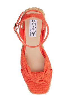 A knotted vamp accent brings modern dimension to a boho-cool sandal lifted by a raffia-wrapped platform and integrated wedge heel. 3" heel; 1" platform Adjustable ankle strap with buckle closure Cushioned footbed with arch support Synthetic upper, lining and sole Imported Chic Ankle Strap Espadrilles For Beach Season, Espadrille Heels For Beach Vacation, Beach Straw Heels, Woven Round Toe Heels For Beach, Woven Round Toe Heels For The Beach, Beach Platform Heels Made Of Espadrille, Ankle Strap Synthetic Espadrilles For Beach Season, Platform Heels For Beach Season, Synthetic Ankle Strap Espadrilles For Beach Season