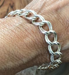 Estate Find:  Looks Like New Condition Sterling Silver 8 Inch Long Double Cable Chain Bracelet.  Traditional double large links measuring 1/2 inch long each by around 3/8 inch wide.  The Sterling Hallmark 925 is on the Lobster Claw Clasp.  This bracelet is a nice weight and just over 18 Grams on my scale.  Suitable for Unisex Teens and Adults.  Think Holidays as the bracelet would be a great accessory or also a wonderful gift. Free Ground Shipping in the US Much Thanks from Luv925... Nickel Free Sterling Silver Link Bracelet, Silver Bracelets With Curb Chain, Elegant Silver Charm Bracelet With Curb Chain, Silver Hallmarked Chain Bracelet, Formal Cuban Link Chain Bracelet With Lobster Clasp, Silver Cuban Link Bracelet With Lobster Clasp As Gift, Adjustable Chain Link Bracelet With Lobster Clasp, Metal Cuban Link Bracelet With Lobster Clasp, Nickel-free Sterling Silver Link Bracelet