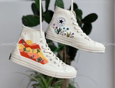 Price includes: Shoes + Embroidery as shown Embroidered Converse/Flower Converse/Custom Converse High Tops Desert And Cactus/ Custom Converse Chuck Taylor 1970s Logo Flower And Cactus I was born and raised in a family with a long embroidery tradition in a small village. My family mainly embroideries traditional clothes. I want them to be different, I put that art into everyday use: shoes, t-shirts, jeans, backpacks, ... In addition to the embroidery patterns that I have posted, I am happy to rec Custom Converse High Tops, Flower Converse, Floral Embroidery Shoes, Mens Suitcase, Floral Converse, Dinosaur Shoes, Converse Wedding Shoes, Embroidered Converse, Cute Converse