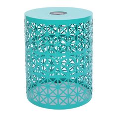 a blue metal trash can with holes in the side and an intricate design on it