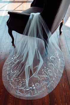 a chair with a veil on top of it