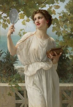 an image of a woman holding a mirror