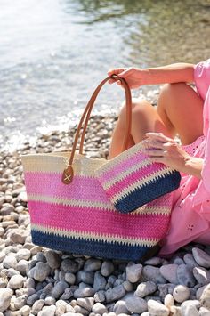 Product Details: ❥ Color: Pink ❥ Pink and navy striped ombre pattern tote bag ❥ Sleek brown stitched double handles ❥ Bring some brightness to the beach with this fun summer tote! ❥ Colorful and roomy ❥ This lightweight bag is ideal for carrying all your essentials in the warm weather ❥ The perfect accessory for all your beach vacay trips! ❥ Materials: natural paper straw and pu ❥ Double shoulder straps ❥ Magnetic snap closure ❥ 1 inner slip pockets ❥ Dimensions: 17.5" x 7" x 12" Striped Rectangular Bag With Braided Handles, Striped Beach Bag With Braided Handles, Striped Beach Bag For Everyday Summer Use, Striped Straw Bag With Braided Handles For Shopping, Striped Straw Shopping Bag With Braided Handles, Casual Striped Straw Tote Bag, Casual Striped Bags With Braided Handles, Striped Rectangular Straw Bag For Daily Use, Striped Straw Tote Bag For Everyday Use