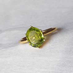 The Buyer Must Be Reads All Details About The Product . Material  14k Yellow Gold  . Gemstone  Natural Peridot  . Gemstone Colour .... Green . Gemstone Size  6x8 mm . Gemstone Shape  Oval . Birthstone  August Birthstone Peridot Band Ring, Green Oval Sapphire Promise Ring, Green Oval Sapphire Ring With Center Stone, Classic Oval Gemstones For Wedding, Classic Oval Green Sapphire Ring, Classic Green Oval Sapphire Ring, Classic Green Sapphire Oval Ring, Elegant Green Oval Topaz Ring, Elegant Lime Green Gemstone Rings