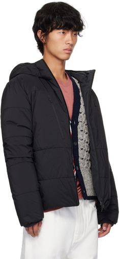 DIST-certified down-filled quilted nylon taffeta jacket. · Stand collar · Two-way zip closure · Zip pockets · Logo plaque at front hem · Partially elasticized hem · Rubberized logo patch at sleeve · Elasticized cuffs · Full quilted taffeta lining Supplier color: Black Fill: 90% goose down, 10% feather. Nylon Quilted Jacket With Zipper For Cold Weather, Nylon Puffer Quilted Jacket For Cold Weather, Nylon Quilted Puffer Jacket For Cold Weather, Nylon Quilted Jacket With Detachable Hood, Quilted Nylon Jacket With Detachable Hood, Long Sleeve Nylon Quilted Jacket With Detachable Hood, Quilted Nylon Parka For Cold Weather, Quilted Nylon Outerwear For Cold Weather, Quilted Nylon Parka With Long Sleeves