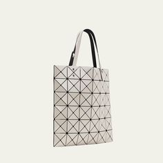 Bao Bao Issey Miyake "Lucent" faux-leather (PVC) tote bag. Lightweight, collapsible style for easy travel. Adjustable tote handles. Easy to clean (wipe with damp cloth); mesh lining. Interior zip pocket. 13.4"H x 13.4"W. Made in Japan. Modern Packable Tote Bag, Trendy Foldable Rectangular Bag, Rectangular Foldable Shoulder Bag For Daily Use, Trendy Rectangular Foldable Bags, Modern Packable Shoulder Bag For Daily Use, Modern Foldable Bag For Everyday, White Packable Tote Bag, White Packable Bags For Daily Use, Foldable Shoulder Bag For Shopping