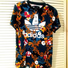 New With Tags Adidas Originals Floral Trefoil Very Oversized Rare Graphic Tee Shirt Size Xs But Will Easy Fit Up To A Large. Casual T-shirt With Vibrant Print, Adidas Multicolor Graphic Print T-shirt, Casual T-shirt With Vibrant Print And Short Sleeves, Casual Short Sleeve T-shirt With Vibrant Print, Sporty Multicolor Adidas Tops, Adidas Sporty Multicolor Tops, Adidas Multicolor Short Sleeve Tops, Adidas Multicolor Crew Neck T-shirt, Trendy Blue Floral Print T-shirt