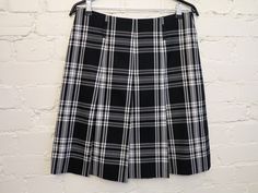 "Womens Black White Tartan Plaid Knee Skirts Low Waist Pleated Skirts Checkered Skirts Back to School Skirts Schoolgirl Skirts Small Size N.B. Color may slightly differ from picture. Label size: 36, UK 10, USA 6 Measurements (taken laying flat): Waist: 15.5\" / 39.5 cm Hips: 19.5'' / 49.5 cm  Length: 21.5\" / 54.5 cm Please check measurements to insure a proper fit. Remember to allow yourself some extra room for movement. You can compare these with something from your closet that fits you well. School Skirts, School Skirt, Checkered Skirt, Knee Skirts, Pleated Skirts, Vintage Vest, Extra Room, Tartan Plaid, Low Waist