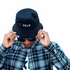 This cool take on our mid-depth design is made with smooth acrylic fabric. An embroidered PKLR logo on the front panel adds a sleek, PKLR finish. Lastly, the 360 brim gives you coverage so you can keep your look stylish, on court or off. Embroidered PKLR logo bucket hat. 100% acrylic. One-size fits all. Available only in black. Bucket Hat Black, Apparel Brand, Acrylic Fabric, Look Stylish, Pickleball, One Size Fits All, Clothing Brand, Bucket Hat, Angeles