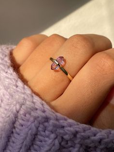 Dainty and beautiful with a bit of an edge, the Aphrodite Ring lets our all time favorite crystal shine in all of her beauty. A stunning way to bring this powerful stone into your every day look, amethyst is historically known to promote serenity, ease stress, and help wearers manifest their highest selves. 💜 * * * Don't know your ring size? View our Ring Size Guide * * * …………………………………. RING SIZE & MATERIAL❋ 14k gold plated sterling silver or rhodium plated sterling silver❋ natural amethyst cry Dainty Stone Rings, Gold Crystal Ring, Amethyst Jewelry Aesthetic, Aphrodite Ring, Stone Rings Women, Solid Opal Ring, Purple Jewellery, Crystals Ring, Amethyst Rings