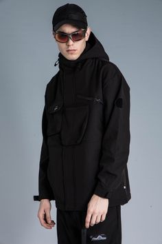 The Asymmetrical Front Pocket Gorpcore Windbreaker showcases a future-forward design with its hidden zipper closure, wind flap secured by concealed buttons, and an asymmetrical multi-pocket design. Its overall texture resembles a honeycomb, thanks to the complex fleece process, providing not just visual appeal but also tactile satisfaction. This piece is finished with a hood, premium fabric, and a slightly oversized fit, ideal for those who seek innovation and functionality in their outdoor gear Modern Utility Jacket With Pockets For Streetwear, Modern Black Windbreaker With Pockets, Cyberpunk Black Windbreaker With Pockets, Urban Black Windbreaker With Functional Pockets, Black Utility Windbreaker With Side Pockets, Nylon Techwear Outerwear With Zip Fly, Black Techwear Utility Jacket With Pockets, Black Functional Windbreaker With Cargo Pockets, Functional Windbreaker With Side Pockets