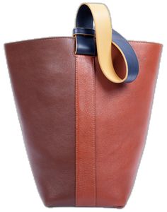 Cognac Leather Bag With Round Handle, Brown Bucket Bag With Round Handle For Shopping, Designer Leather Bucket Bag With Handles, Soft Pebbled Leather Bucket Bag Tote, Office Tote Bucket Bag With Smooth Grain, Office Bucket Bag With Smooth Grain In Tote Style, Brown Calf Leather Bucket Bag For Everyday, Brown Leather Bucket Bag For Shopping, Designer Bucket Bag With Leather Handles For Office