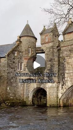 an old stone castle with a bridge over the river in scotland's most unique area