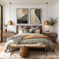 a large bed sitting in a bedroom next to two pictures on the wall above it