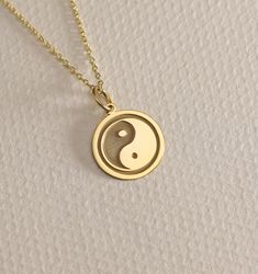 14K Real Solid Gold  Yin Yang necklace ● Material of pendant: Solid Gold 14k ( REAL GOLD ) ● Metal Stamp: 14L ( REAL GOLD ) ● The pendant is available in 6 sizes: - 14,0 mm / 0,55 inches ( Diameter ) In the photos - 15,3 mm / 0.60 inches ( Diameter ) - 16,5 mm / 0,65 inches ( Diameter ) - 19,1 mm / 0,75 inches ( Diameter ) - 21 mm / 0,82 inches ( Diameter ) - 23 mm / 0.90 inches ( Diameter ) ( In the photos the size is 14mm / 0.55 inches Diameter ) ( Jump Ring inner diameter: 4 mm ) ● Material O Yin Yang Charm, Yin Yang Necklace, Jewelry Dainty, Religious Jewelry, Layered Necklace, Yin Yang, Jump Rings, Metal Stamping, Real Gold