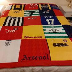 This supersize luxury memory blanket can be a graduation quilt, made from your own college or school clothes, sports t-shirts and items, and is handmade especially for you. It's a super-sized 75 by 75 inch memory blanket that will hold together all your treasured memories of being at school, college or university. It might be a blanket made using loved ones clothes (a bereavement blanket).  The three-layered quilt has special wadding filler and a brand new luxury backing and border sheet - colour and backing of your choice - choose a colour that matches your graduation or college colours. You just let me know what colour you want and I'll do the hard work of sourcing it and creating the quilt. If you forget to specify colour then don't worry, as I'll just drop you a message via Etsy to get Graduation Quilt, Tie Pillows, Old Baby Clothes, Sport T Shirts, Memory Blanket, College Colors, Memory Pillows, Soccer Shorts, Blanket Chest