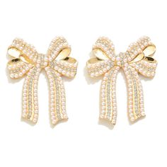 Beautiful Pearl + Rhinestone Bow Earrings are perfect for your holiday party. Zinc Alloy Lead and Nickel Free 1.77"L. Glamorous Rhinestone Earrings For Gifts, Jeweled Dangle Pearl Earrings For Parties, Elegant Gold Earrings For Holiday, Elegant Gold Earrings For The Holiday Season, Party Pearl Earrings, White Pearl Earrings For Party, Jeweled Pearl Earrings For Party, Party Crystal Pearl Earrings With Sparkling Stones, White Jeweled Crystal Earrings For Party