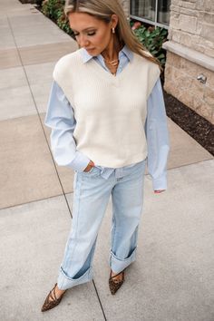 Getting ready for work just got EASY. Our Tay Twofer Sweater Vest Shirt is all one piece and lays perfectly without bunching. Pair with a trouser for a chic and simple office look. True to size. Ariel is 5'5" and is wearing a small.