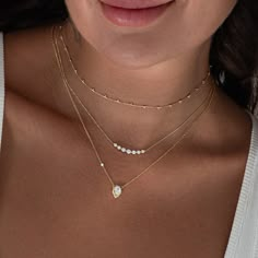 14k Yellow Gold Necklace with Natural Diamonds. Like a delicate piece of Diamond lace floating against your collar, this charming necklace boasts a special sparkle! Layer with any piece in your necklace collection or wear solo as your newest signature.