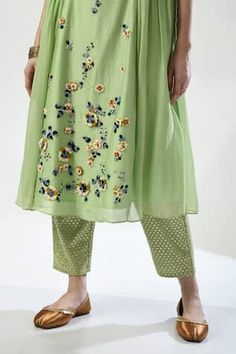 Green side tie kurta with placed dori embroidery featuring floral motifs embellished by beads. Comes with pant and dupatta. - Aza Fashions Summer Floral Embroidery Pista Green Sets, Summer Festive Floral Embellished Sets, Traditional Designer Wear Bottoms For Spring, Traditional Bottoms For Spring Designer Wear, Traditional Floral Embellished Sets For Designer Wear, Festive Designer Bottoms With Floral Embroidery, Festive Bottoms With Floral Embroidery, Traditional Floral Embellished Sets For Summer, Festive Spring Bottoms With Printed Motifs