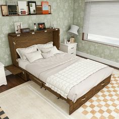 a bed sitting in a bedroom next to a white dresser and window covered with blinds