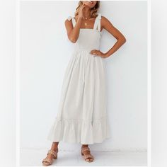 100% Viscose Chic Midi Sundress With Adjustable Straps, Elegant Maxi Dress With Adjustable Straps For Day Out, Chic Midi Dress With Adjustable Straps For Day Out, Beige Sundress With Spaghetti Straps For Garden Party, Elegant Summer Sundress For Brunch, Elegant Flowy Midi Dress With Adjustable Straps, Beige Spaghetti Strap Midi Dress With Ruffles, Chic Square Neck Sundress For Brunch, Sleeveless Beige Midi Dress With Tie Straps