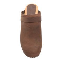 "The Tia is a hand-made fashionable wooden clog, featured in soft oiled full grain leathers. * Hand-made in Europe * Oiled Leather * 2.75\" / 70mm heel and .75\" / 20mm platform * Genuine European wooden outsole with rocker bottom to propel your foot forward * Wood outsole harvested from sustainable European forests ---> Ships in 1 business day from the US ---> Sizing Conversion EU US Women's EU 35 ---- US 5 EU 36 ---- US 5.5 - 6 EU 37 ---- US 6.5 EU 38 ---- US 7 - 7.5 EU 39 ---- US 8 - 8. Classic Brown Slip-on Clogs, Classic Brown Plain Toe Clogs, Classic Brown Clogs With Rubber Sole, Leather Clogs With Plain Toe, Classic Brown Clogs With Leather Footbed, Leather Clogs With Wooden Heel In Natural Wood Color, Leather Mules With Wooden Heel In Natural Color, Natural Leather Mules With Wooden Heel, Classic Leather Clogs With Wooden Heel