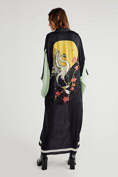 Featuring a colorful and statement design on the back, this maxi kimono is featuring in a silky fabric and shapeless silhouette. * Wide sleeves * Maxi length * Arm vents | Moon Dance Maxi Kimono by Free People in Black Moon Dance, Maxi Kimono, Free People Accessories, Silky Fabric, Rising Sun, Kimono Dress, Wide Sleeves, New Wardrobe, Kimonos