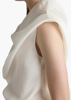 An airy, cowl-necked top in which hand-tacked silk gazar twists and turns about the body. Fully lined in silk organza. Concealed zipper closure. Silk Gazar, Leather Outerwear, Cowl Neck Top, Belt Accessories, Boot Pumps, Silk Organza, Oliver Peoples, Pumps Flat, Skirt Pants