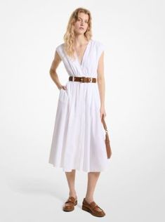 The versatile dress for day, night, work and beyond is here. Crafted from organic cotton poplin with a touch of stretch, it features a deep crossover neckline and belted bodice that descends into a crisp circle skirt. Pair it with kitten heels and a mini bag for a ladylike look. Cotton V-neck Belted Dresses, Chic Fitted Cotton Belted Dress, Fitted Cotton Belted Dress For Spring, Spring V-neck Belted Dress For Daywear, Chic Cotton Belted Daywear Dress, Chic Cotton Belted Dress For Daywear, Elegant Fitted Cotton Belted Dress, Cotton Belted Day Dresses, Daywear Cotton Belted Dress