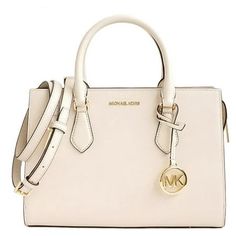 Elegantly streamlined, the Sheila satchel is a classic style you can carry all day and into the night. Its crafted from faux Saffiano leather with minimal hardware, and has internal pockets for organizing your belongings. Carry it by the elegant top handle, or attach the included shoulder strap to wear it crossbody. Satchel Faux leather 88.92% coated canvas/11.08% polyester Gold-tone hardware 11W X 8H X 3.25D Handle drop: 4 Interior details: back zip pocket, 2 front slip pockets Lining: 100% pol Coin Purse Tutorial, Michael Kors Handbag, Crossbody Satchel, Handbag Pattern, Handbag For Women, Into The Night, Satchel Handbag, Vintage Purse, Purse Patterns