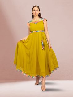 Make a statement with our Harmony Hues yellow fusion flare dress. Crafted from chiffon, this long and flowing umbrella dress is ideal for any occasion, adding a touch of elegance to your ensemble. Elevate your style with this stunning piece. Key Specifications : Material Chiffon Occasion Casual Type Fusion/Indowestern Umbrella Dress, Elevate Your Style, Leggings Shop, Salwar Kameez, Mommy And Me, Indian Dresses, Short Tops, Flare Dress, Your Style