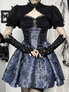 The Mermaid Gothic Lolita dress and bolero exude enchanting elegance. The intricate black ribbon lace-up, blue rose jacquard, and lace patchwork combine to create a spellbinding silhouette. Adorned with bead chains and a glittering gem pendant, this dress features a black bolero with puff sleeves and an elastic back for added comfort. Available in sizes XS-L. Black ribbon lace-up, Blue rose jacquard, Lace patchwork, Bead chains, Glittering gem pandent, Puff sleeves shrug, Elastic back of dress Material:Polyester spandex Color: Blue Dress, Black Bolero Size: XS, S, M, L Bolero Size Measurement: Unit: CM Shoulder Sleeve Length XS 33.5 25.5 25 S 34.5 26 26 M 35.5 26.5 27 L 37 27 28 Dress Size Measurement: Unit: CM Bust Waist Length XS 67-83 60-66 60 S 71-87 64-70 62 M 75-91 68-74 64 L 81-97 7 Dress And Bolero, Dress Bolero, Gem Pendant, Bolero Dress, Dress Weights, Fall Blouse, Jacquard Skirt, Sleeveless Skirt, Hip Skirt