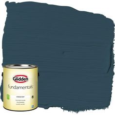 a can of blue paint next to a white wall with the word glidden on it