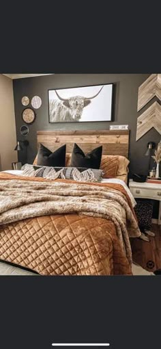 a bedroom with a bed, nightstands and pictures on the wall above it is featured in this post