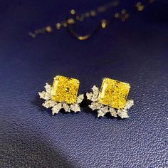 As seen on Grammy winner “Victoria Monet” One of a kind stud earrings made from lab made yellow diamonds and marquise cz diamonds in the bottom Sku GAE0167 Yellow Diamond Earrings With Prong Setting, Yellow Diamond Cut Fine Jewelry Earrings, Yellow Diamond Cut Earrings Fine Jewelry, Luxury Marquise Cut Earrings Gift, Luxury Marquise Cut Earrings As Gift, Dazzling Marquise Cubic Zirconia Diamond Earrings, Yellow Diamond Accent Earrings For Anniversary, Marquise Cut Diamond Eyes Earrings Gift, Yellow Diamond Accented Earrings For Anniversary