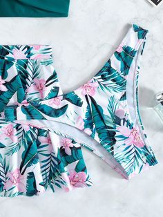 Experience the fusion of vibrancy and comfort with our botanical-inspired tankini set, perfect for adding a dash of sophistication to your swimwear ensemble. The set is designed for those who value a blend of aesthetic charm and functional design, suitable for a variety of sunny escapades. Sizes: The set is available in multiple sizes, ensuring a proper fit for a diverse range of body types. Material: This tankini is crafted from a soft, stretchable fabric that ensures comfort and durability. Sp Skirt Coverup, Coverup Skirt, Of Aesthetic, Beach Skirt, Boho Patterns, Bra Types, Surf Style, Tankini Set, Swimwear Outfit